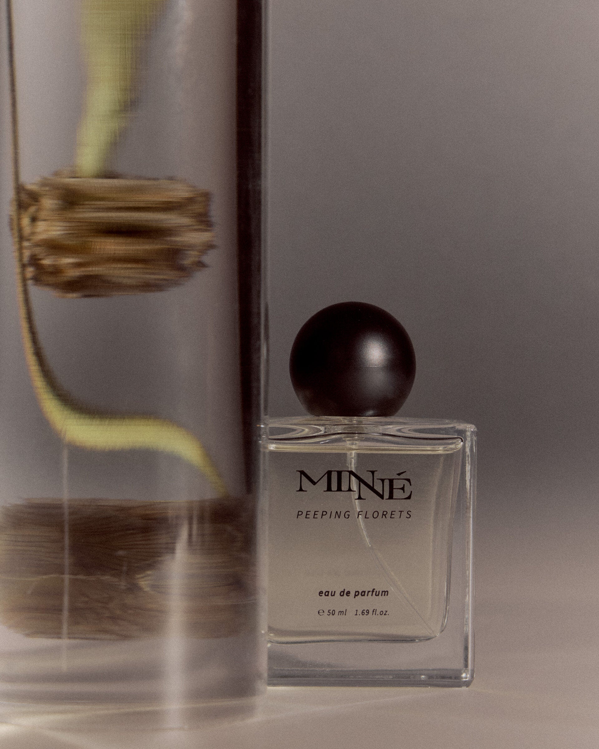 Peeping Florets — the bottle among dried stems